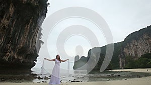 Blonde Girl Demonstrates her Wedding Dress