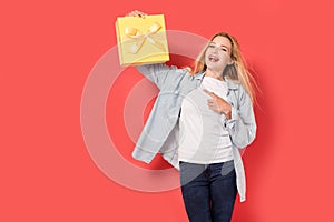 Blonde girl is enthusiastic about gift