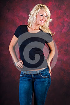 blonde girl fashion model in blue jeans