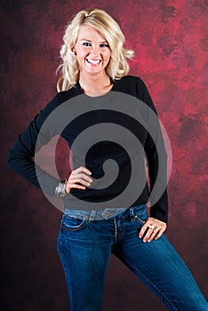 blonde girl fashion model in blue jeans