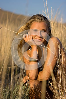 Blonde girl in the field