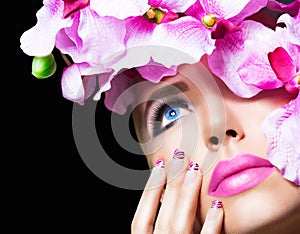 Blonde girl with flowers and perfect makeup