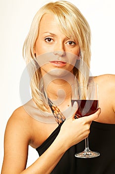 Blonde girl with glass of wine