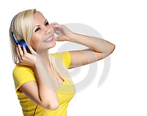 Blonde Girl with Headphones isolated on white. Young DJ