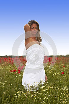 Blonde Girl in the Poppies Field