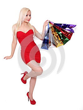 Blonde girl with shopping bags