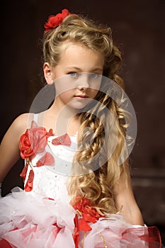 Blonde girl in a smart dress