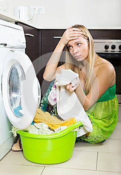 Blonde girl and washing machine