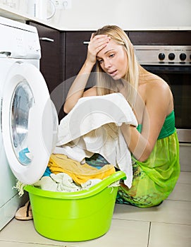 Blonde girl and washing machine