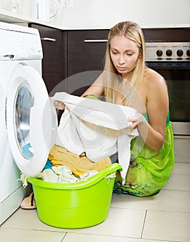 Blonde girl and washing machine