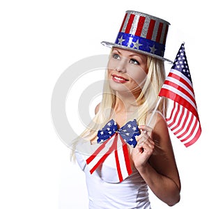 Blonde Girl waving Small American Flag isolated on white