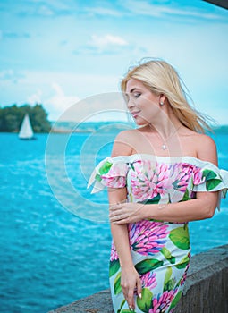 Blonde hair woman portrait at good sunny day