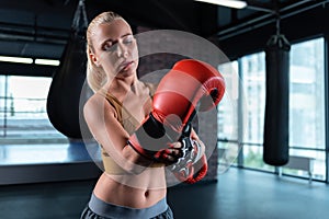 Blonde-haired female athletic woman working out