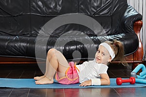 Blonde little girl home training