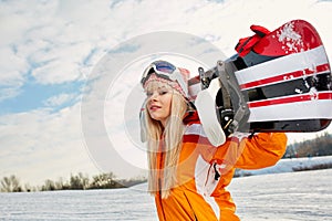 blonde snowboarder on snow