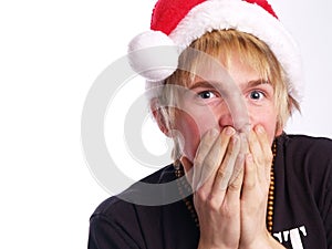 Blonde Teen Boy with a Santa Hat