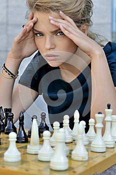 Blonde thought while playing chess.