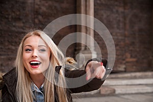 Blonde tourist suggesting a sightsee