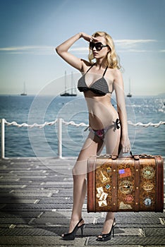 blonde tourist with vintage bag