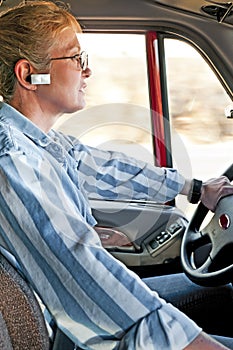 Blonde Truck Driver With Hands Free Phone System