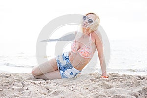 Blonde woman on the beach