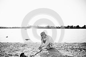 Blonde Woman On The Beach, Picnic With Kitten