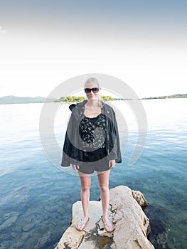 Blonde woman holidaying in croatia