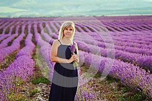 Blonde woman in lavender field