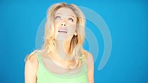 Blonde woman looking arround empty space