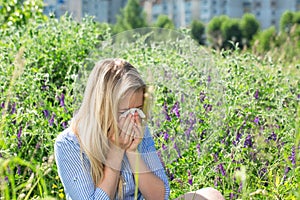 Woman suffering from allergies