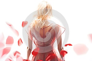 Blonde Woman Wearing a Soft Red Silk Dress Looking Like a Rose Flower