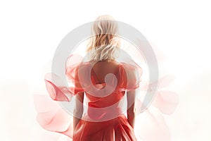 Blonde Woman Wearing a Soft Red Silk Dress Looking Like a Rose Flower
