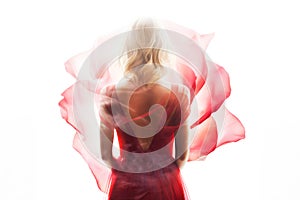 Blonde Woman Wearing a Soft Red Silk Dress Looking Like a Rose Flower