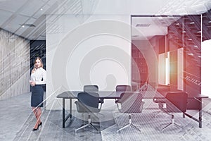 Blonde woman in white conference room