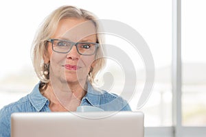 Blonde woman work desk