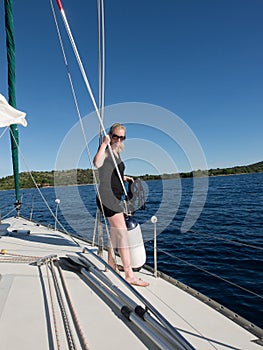 Blonde woman on a yacht in croatia