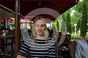 Blone girl in cafe in Istanbul, Turkey. photo