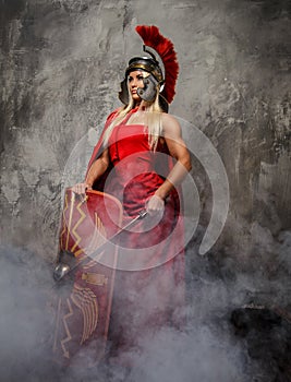 Blong roman woman in red dress.