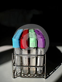 Blood collection tubes with colored stoppers