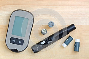 Blood Glucose meter with finger pricker, lancing pen device kit with drum to check blood Glucose