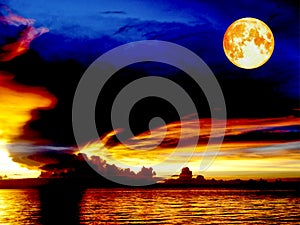 blood moon sunset sea ship on horizon line bird fly on night cloud