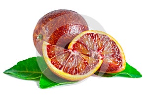 Blood orange with green leaves isolated on white background