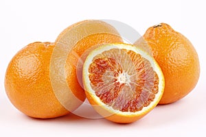 Blood oranges on white