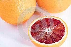 Blood oranges on a white background