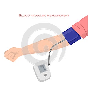 Blood pressure cuff on arm over the brachial pulse attached to automated sphygmomanometer