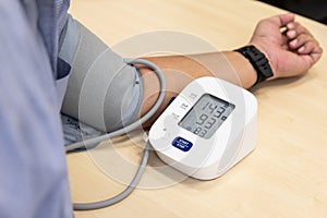 Blood pressure examination result suggested hypertension with high systolic and diastolic readings photo