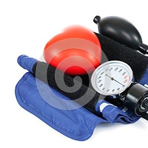 Blood pressure measuring tools with red toy heart