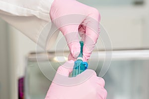 Blood sampling tool in hands of nurse