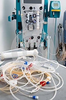 Blood tubes with hemodialysis machine in the background