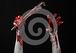 Bloody hand holding an adjustable wrench, bloody key, crazy plumber, bloody theme, halloween theme, black background,isolated